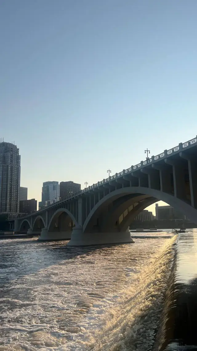 The Third Avenue Bridge over St. Anthony Falls in Minneapolis at sunset